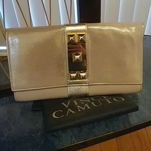Vince Camuto gold &tan leather clutch